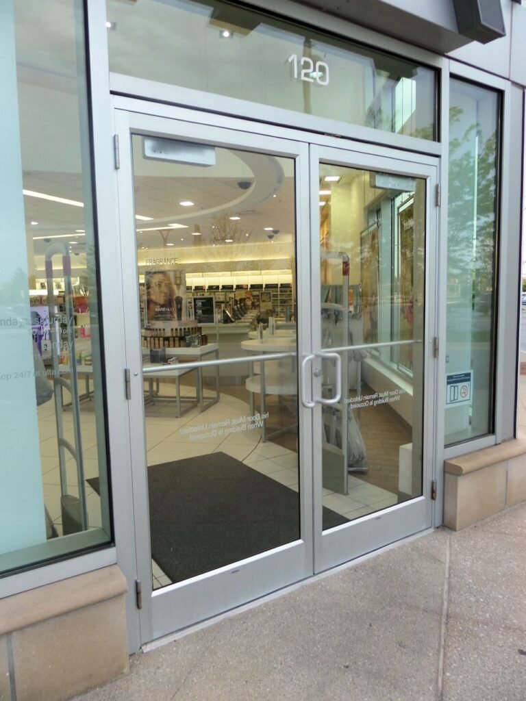 Fast Denver commercial glass door replacement for storefront aluminum entry doors at a retail business